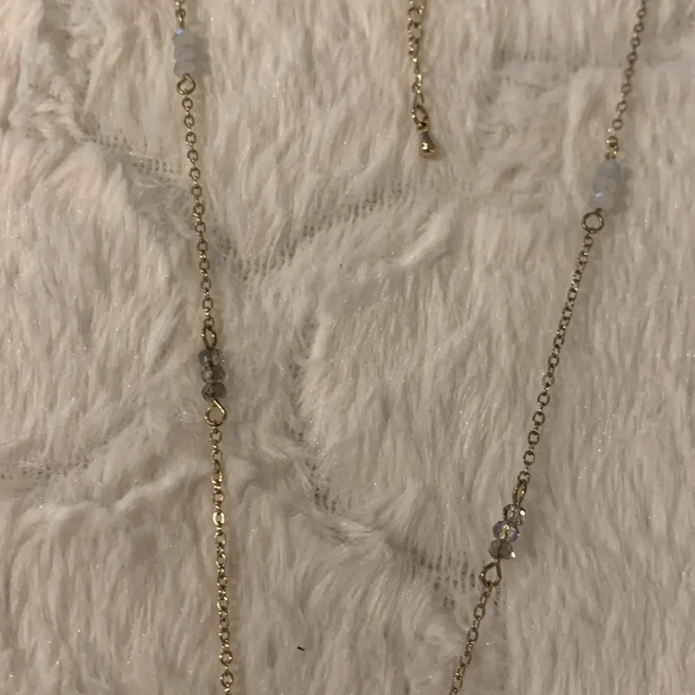 Disc‎ pendant necklace with some little beads on chain.Beautiful and sparkly.